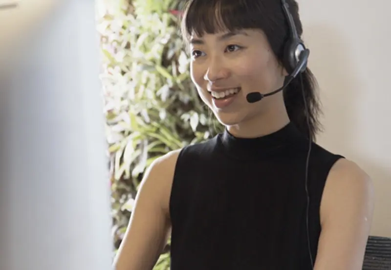 strategy call smiling support person with headset