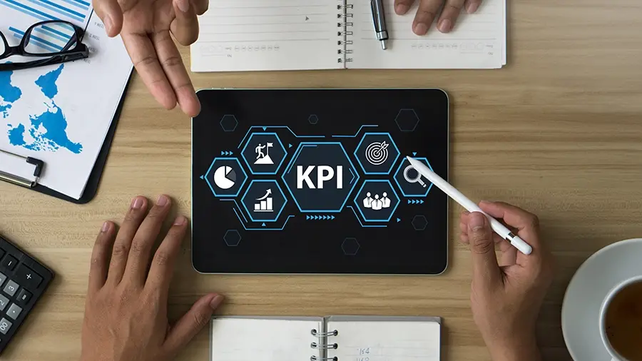 kpi key performance indicators on tablet discussion