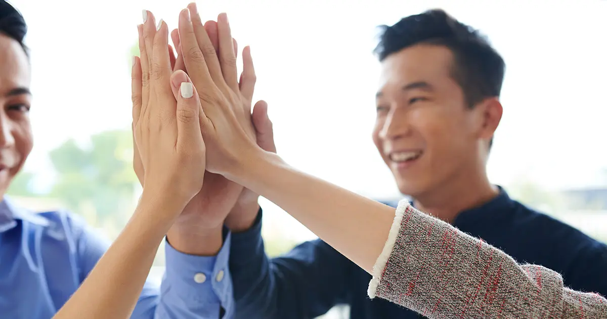link building outreach business group giving high five